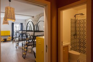 14 people dorm room with private bathroom at The House of Sandeman Hostel & Suites